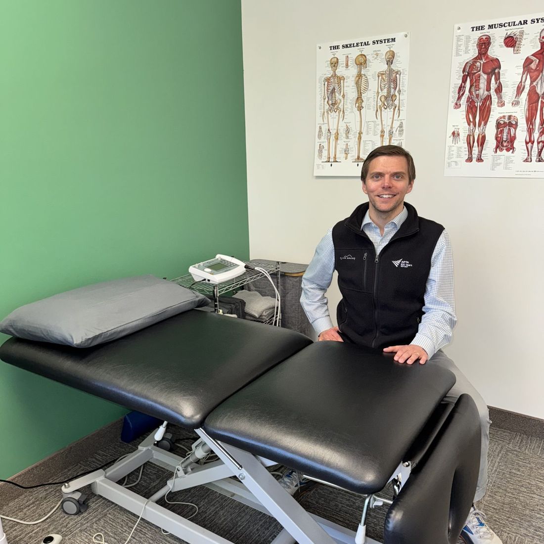 Private treatment room with an adjustable table